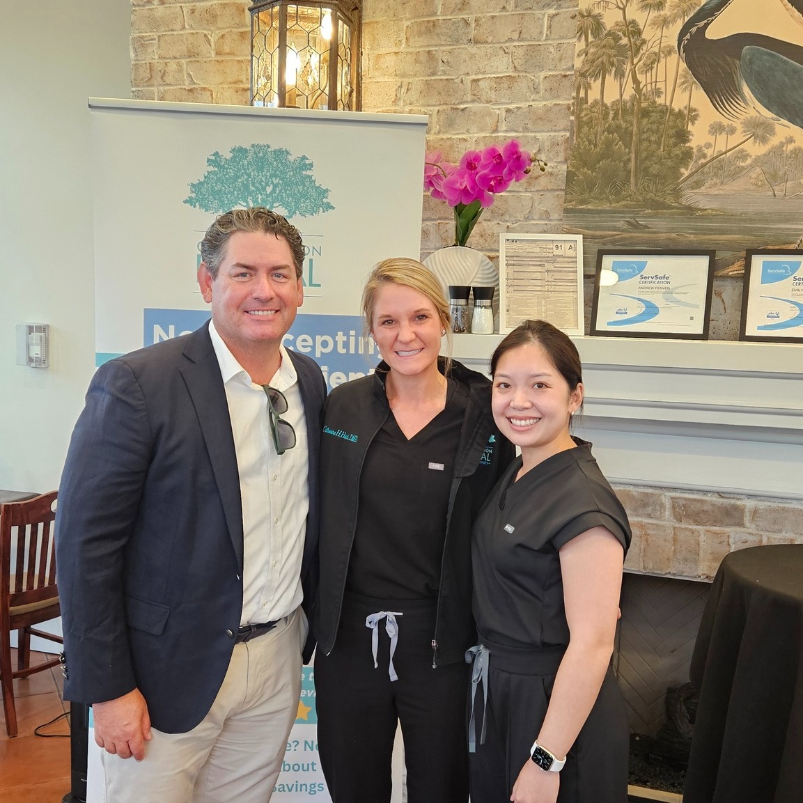Dr. Matthew Allen with Drs. Hatch and Tran of Godley Station Dental